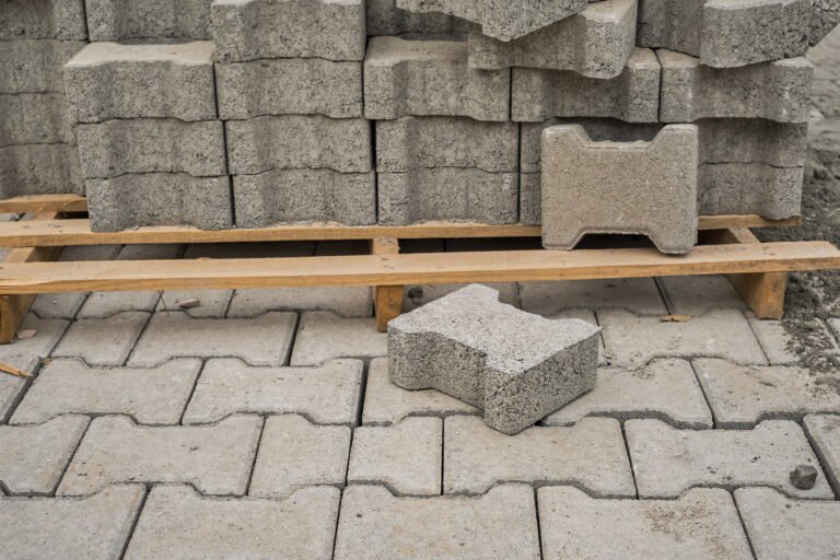 paving-slabs-stacked-pallet-road-repair-process-closeup-selective-focus-tiles-seasonal-reconstruction-pavement-walking-paths-parks